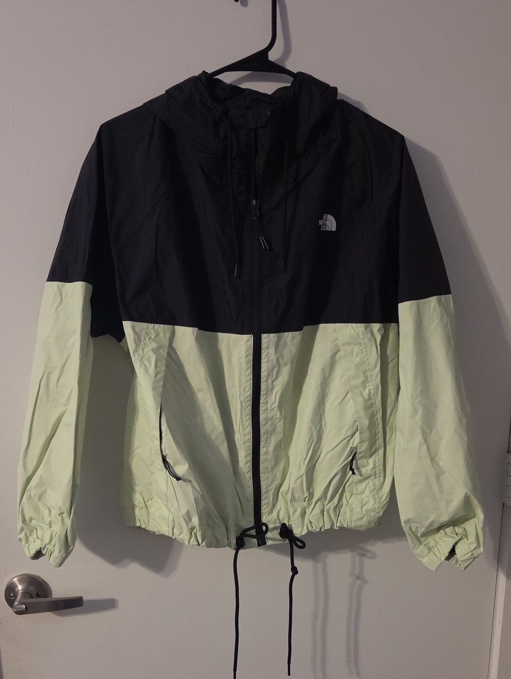 The North Face Black and Pale Green Colorblock Windbreaker Jacket